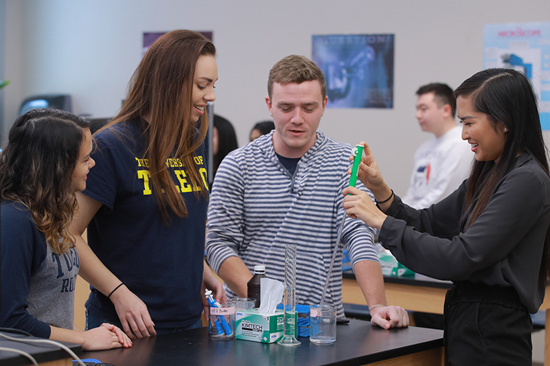 Pharmacy students working together in a lab
